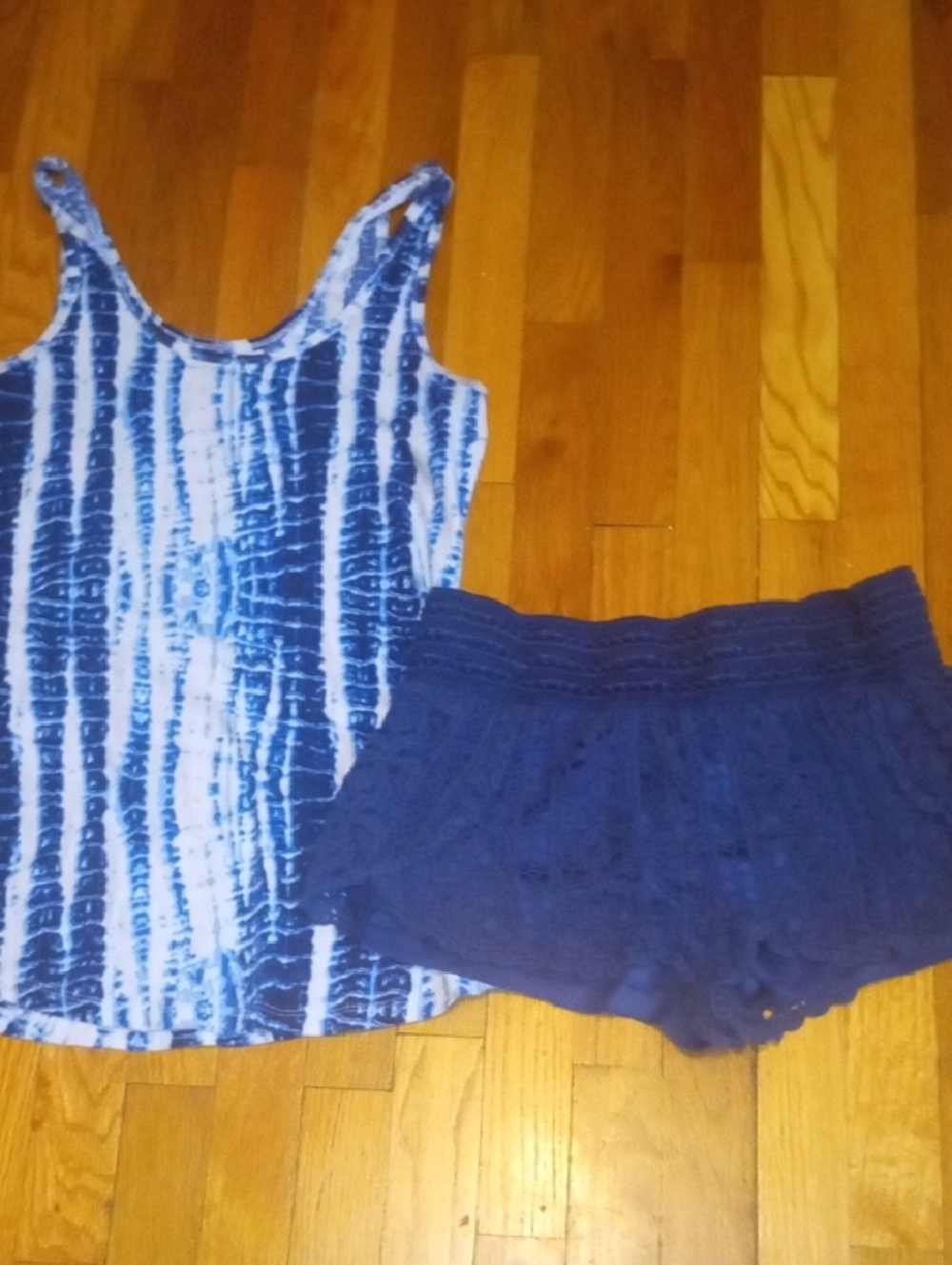 women large blue crochet style shorts and tie dye tank